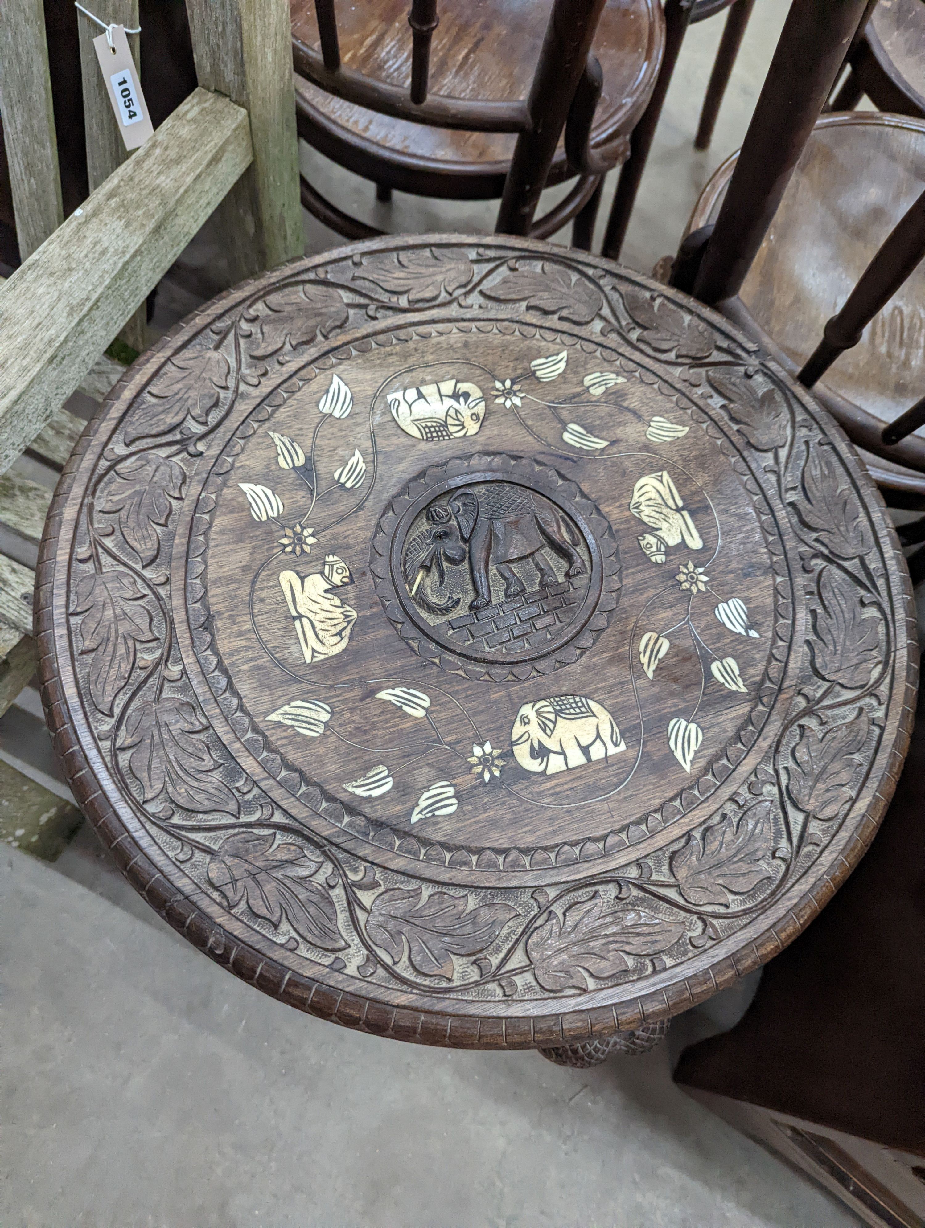 An Indian bone inlaid circular carved hardwood occasional table, diameter 52cm, height 59cm